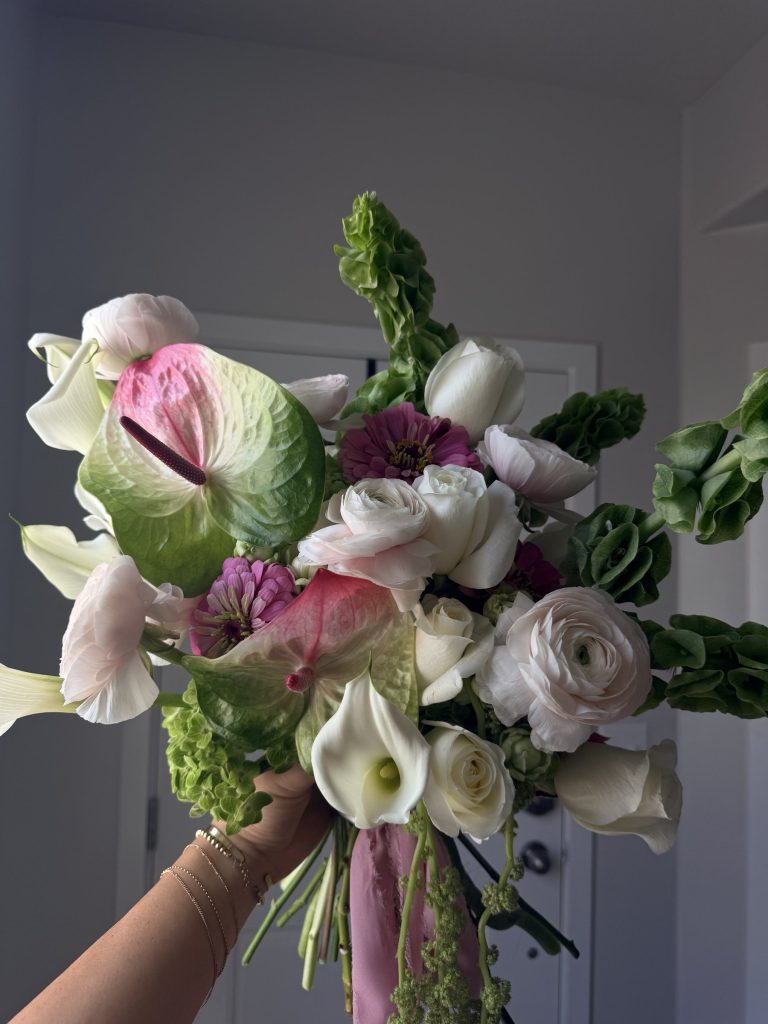 White anthurium, ranunculus and pink calla bouquet